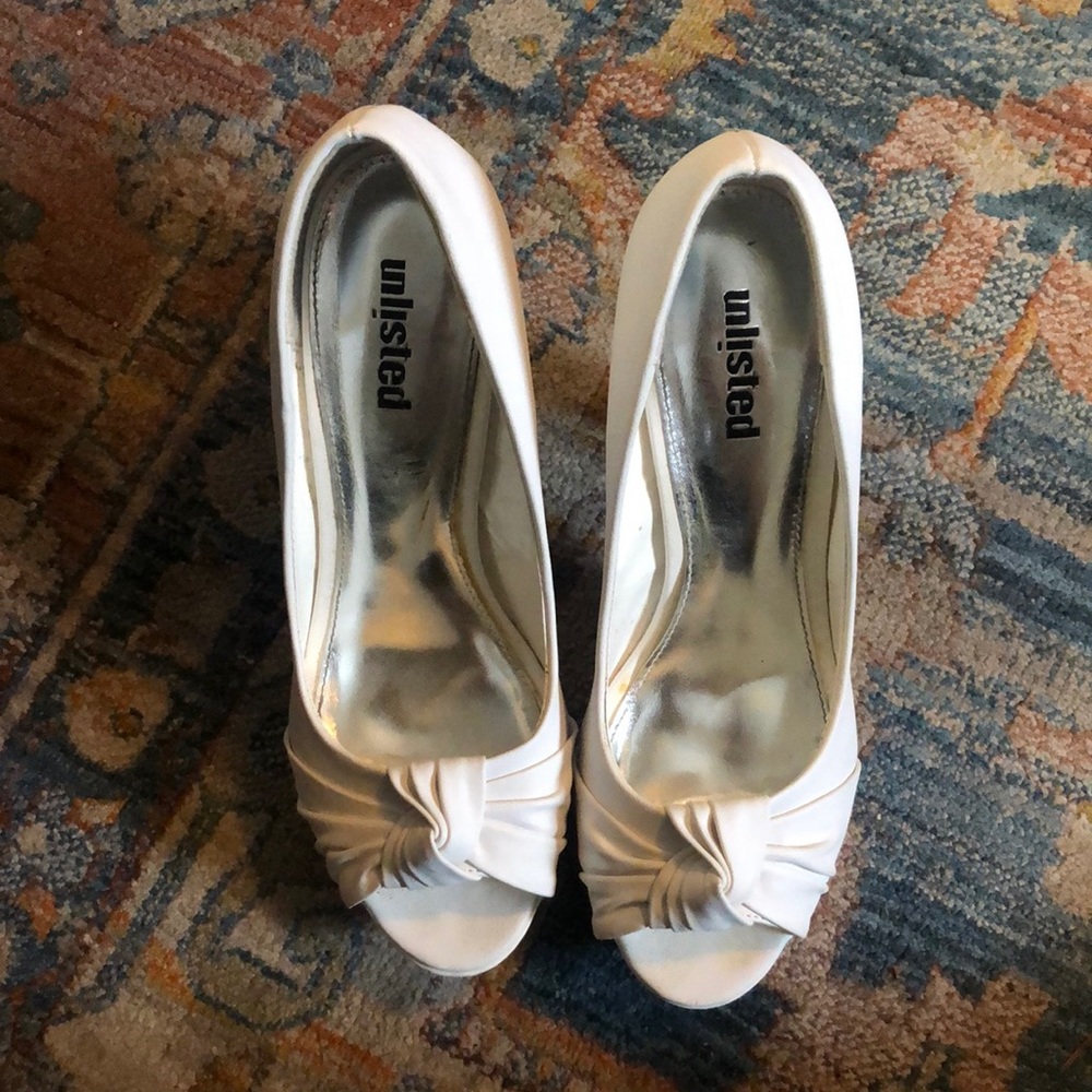 White peeptoe heels